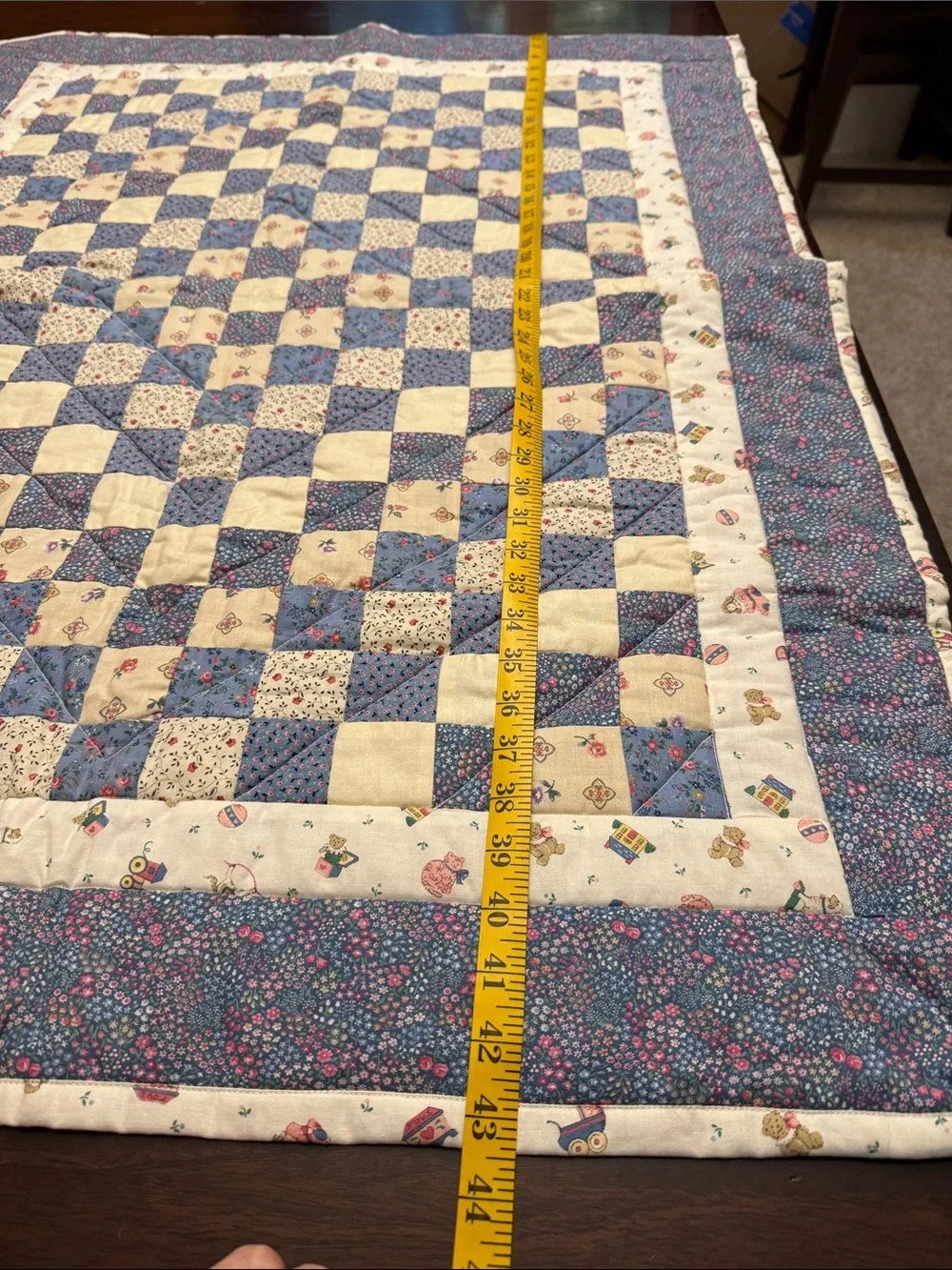 Quilted baby blanket.